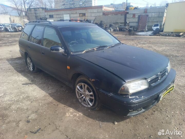 Генератор Nissan Avenir CD20 TD