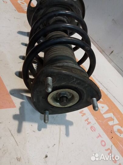 Стойка амортизатора переднего левого Mazda Mazda6