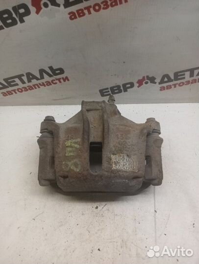 Суппорт тормозной передний левый Peugeot 206 седан