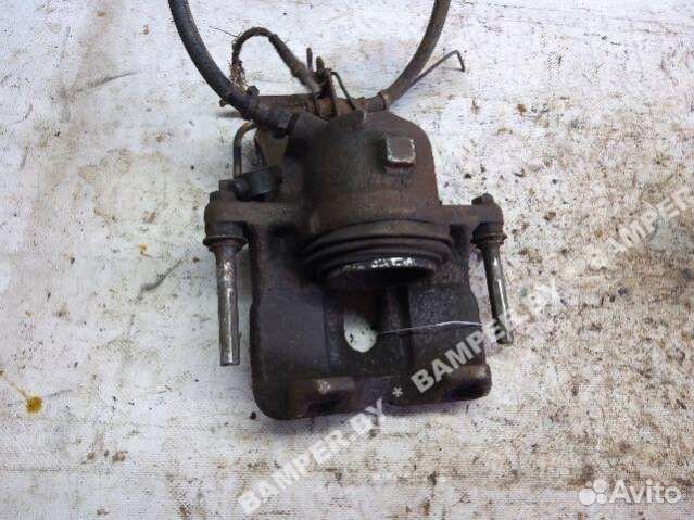 Суппорт тормозной передний левый Renault Safrane