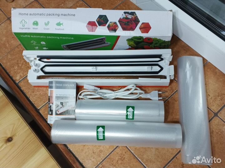Вакуумный упаковщик новый