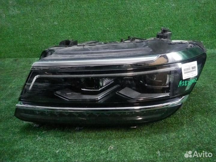 Фара левая Volkswagen Tiguan