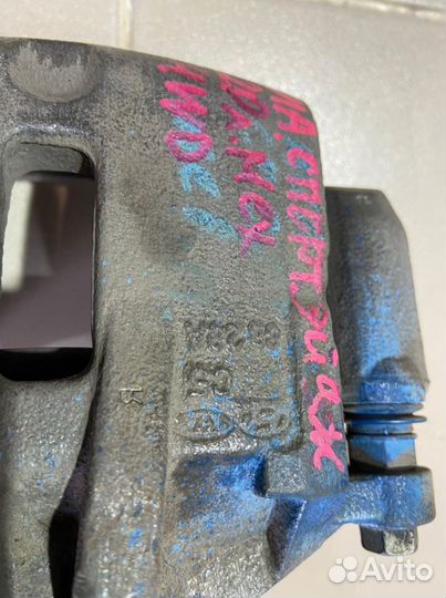 Суппорт передний левый Kia Sportage 2008