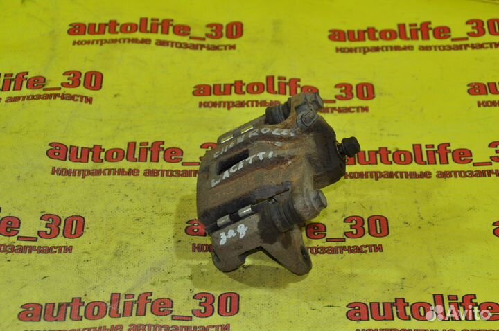 Суппорт задний левый Chevrolet Lacetti