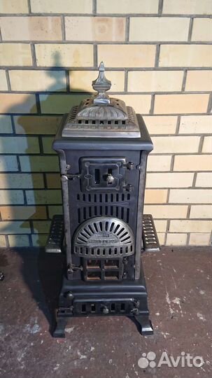 Старинная чугунная печь