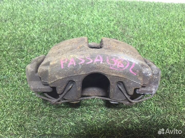 Суппорт передний левый Volkswagen Passat B6 BVY