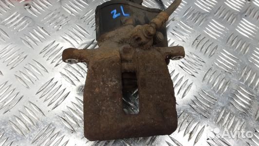 Суппорт тормозной задний левый volkswagen tiguan 1