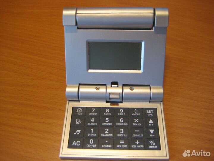 Калькулятор KD-9908 и Часы-будильник в нём