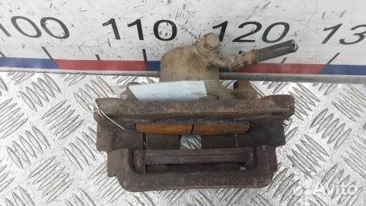 Суппорт тормозной задний левый toyota land cruiser