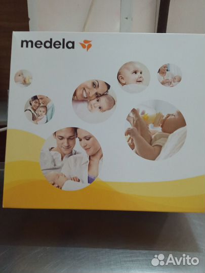 Молокоотсос электрический medela