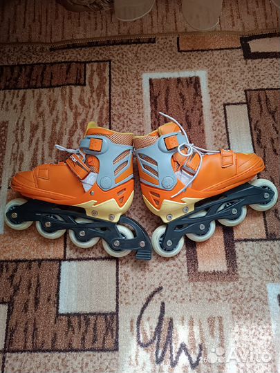 Роликовые коньки