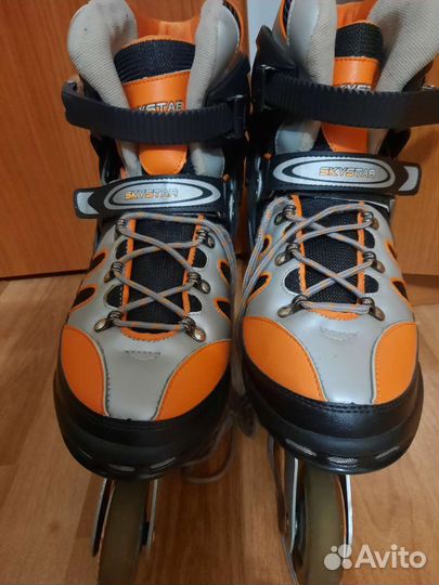 Роликовые коньки