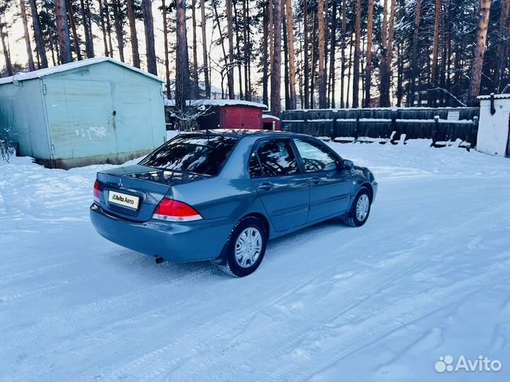 Mitsubishi Lancer 1.6 AT, 2009, битый, 290 000 км