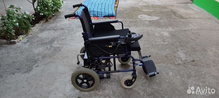 Инвалидная коляска с электроприводом