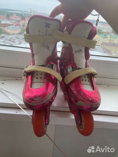 Роликовые коньки