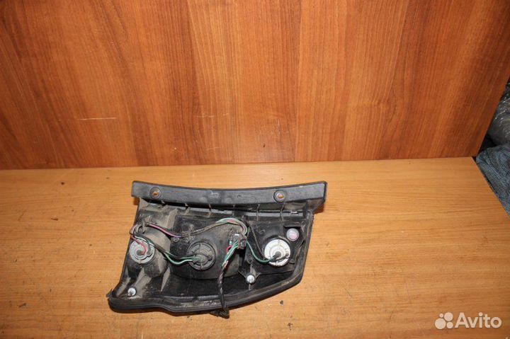 Фонарь заднего хода задний левый Mitsubishi