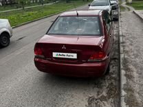 Mitsubishi Lancer 1.6 MT, 2006, 200 000 км, с пробегом, цена 390 000 руб.