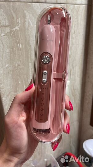 Электрическая зубная щетка