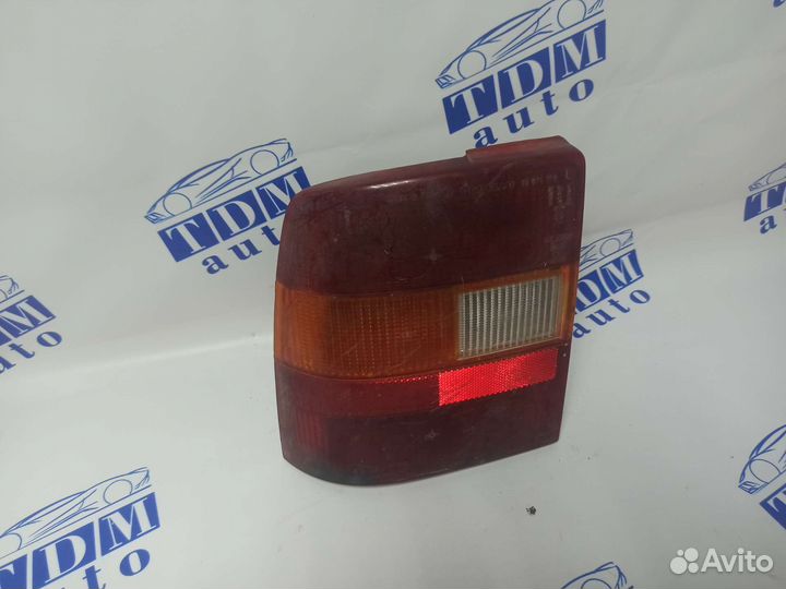 Задний левый фонарь Опель Вектра А