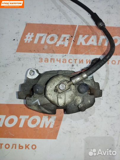 Суппорт тормозной передний левый Volkswagen Polo 5