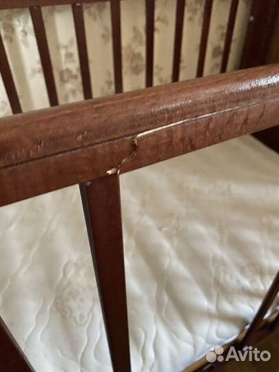 Детская кроватка с поперечным маятником