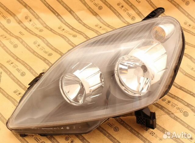 Фара левая opel zafira B 05-08