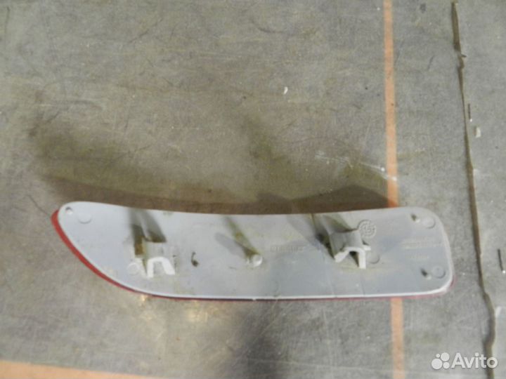 Отражатель бампера заднего левый- Renault Logan 1