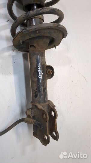 Амортизатор подвески левый передний SsangYong Korando 2010