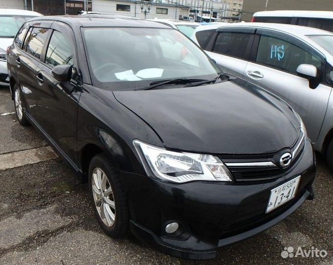 Пластик замка багажника задний Toyota Corolla