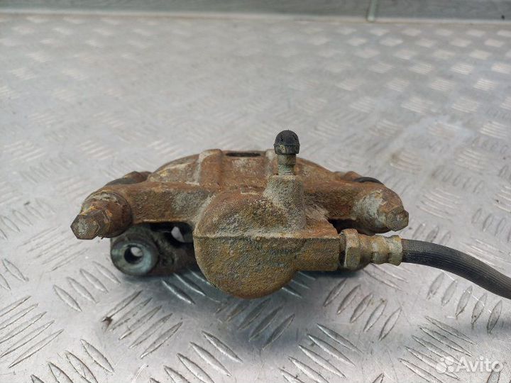 Суппорт задний левый Mitsubishi Lancer 9 CS 4G18