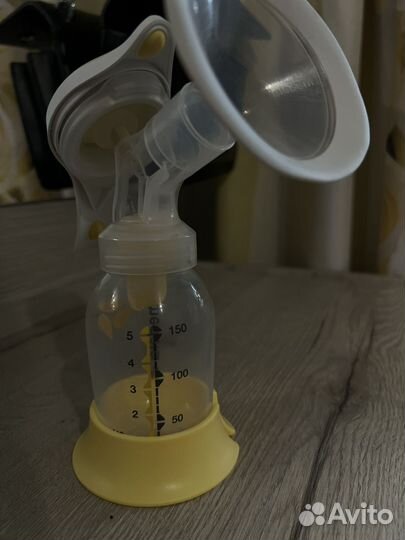 Молокоотсос medela ручной