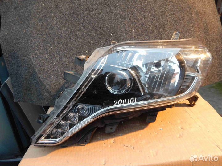 Фара левая Toyota Land Cruiser Prado 150 Series ре