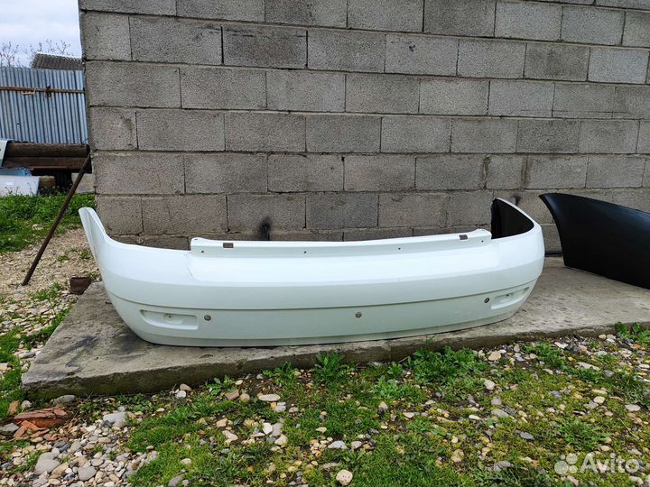 Бампер Задний Приора дорестайл.(седан)