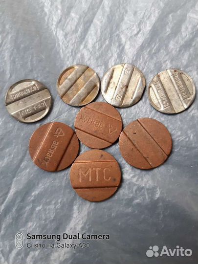 Жетоны для таксофона и метро 90-е годы