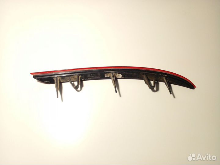 Отражатель в задний бампер левый Opel Astra J