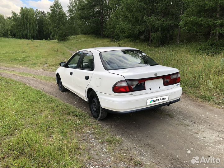 Mazda Familia 1.5 AT, 1997, 360 000 км