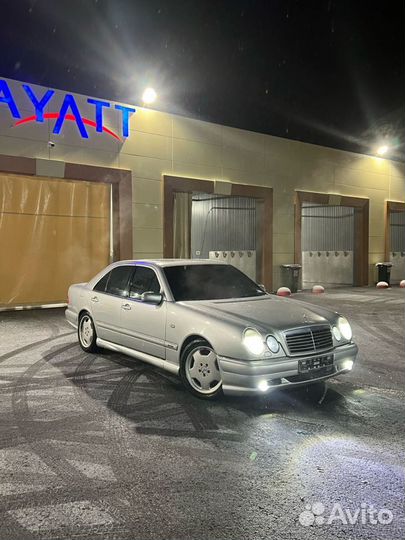 W210 E55 передний бампер обвес