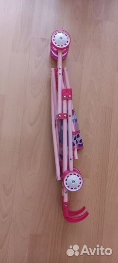 Игрушечная коляска для кукол