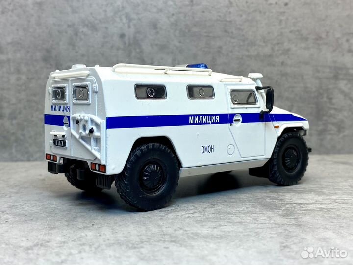 Коллекционная модель газ-233036 тигр омон мвд 1:43