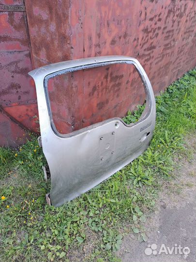 Хлопушка багажника на Ниву Шевроле