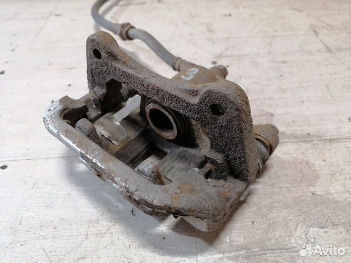 Суппорт тормозной задний Chevrolet Lacetti правый