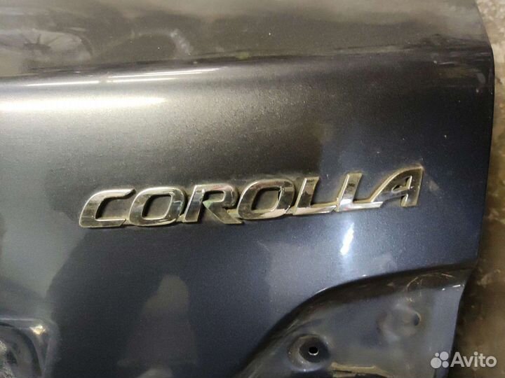 Эмблема багажника Toyota Corolla e 150