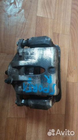 Суппорт тормозной передний правый Kia Sportage 3