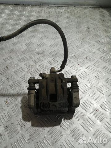 Суппорт тормозной задний правый Ssangyong Actyon