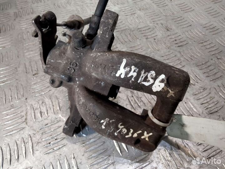 Суппорт задний правый Opel Corsa D