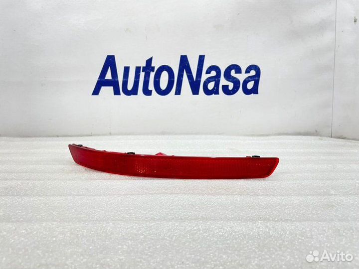 Отражатель в бампер задний левый Kia Rio 3