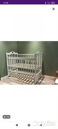 Детская кроватка с маятником