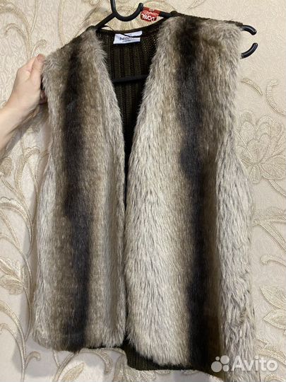 Жилетки меховые женские