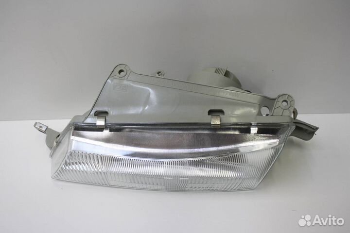 Фара левая Daewoo Nexia рест. (2002 - 2008)