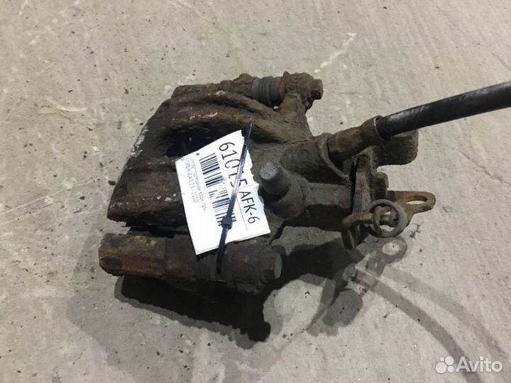 Суппорт тормозной задний правый Ford Kuga 1 2.5 I